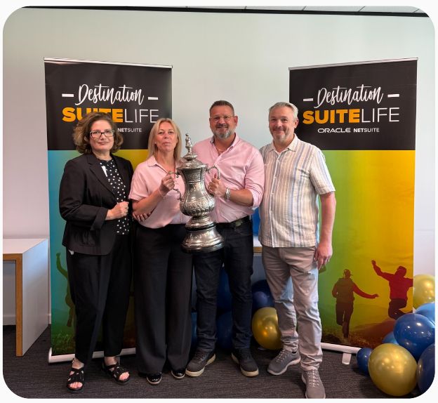 Members of the Web Control team with an award at the Oracle NetSuite Destination SuiteLife event
